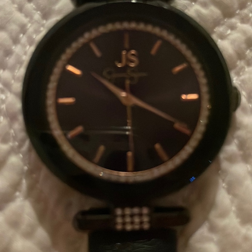 A black Jessica Simpson watch